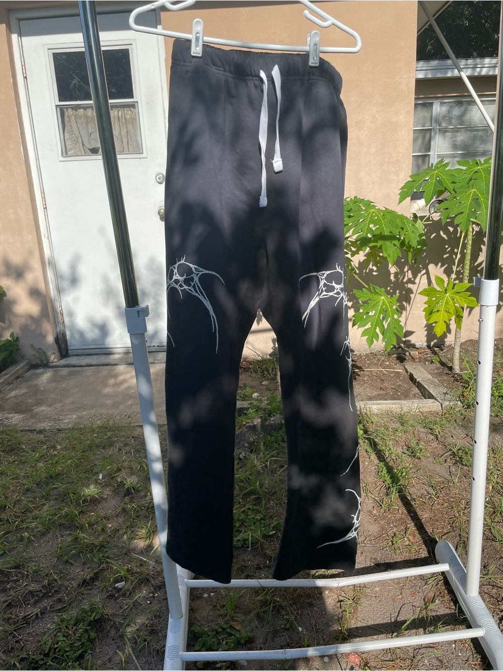 Pacsun Men's Black Drawstring Sweatpants with Subtle Graphic